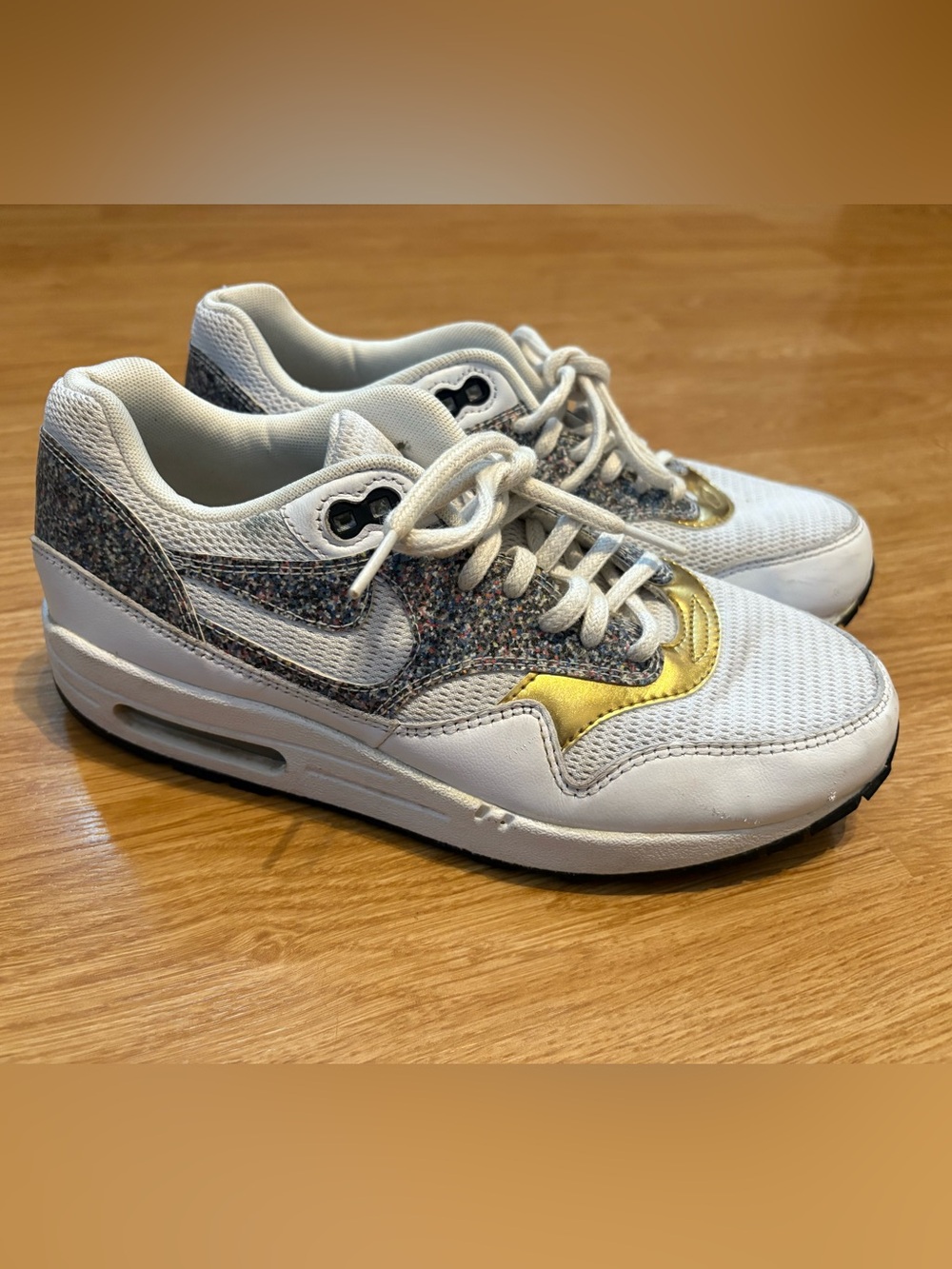 Nike Women's White Sneakers with Multicolor Knit and Gold Accent